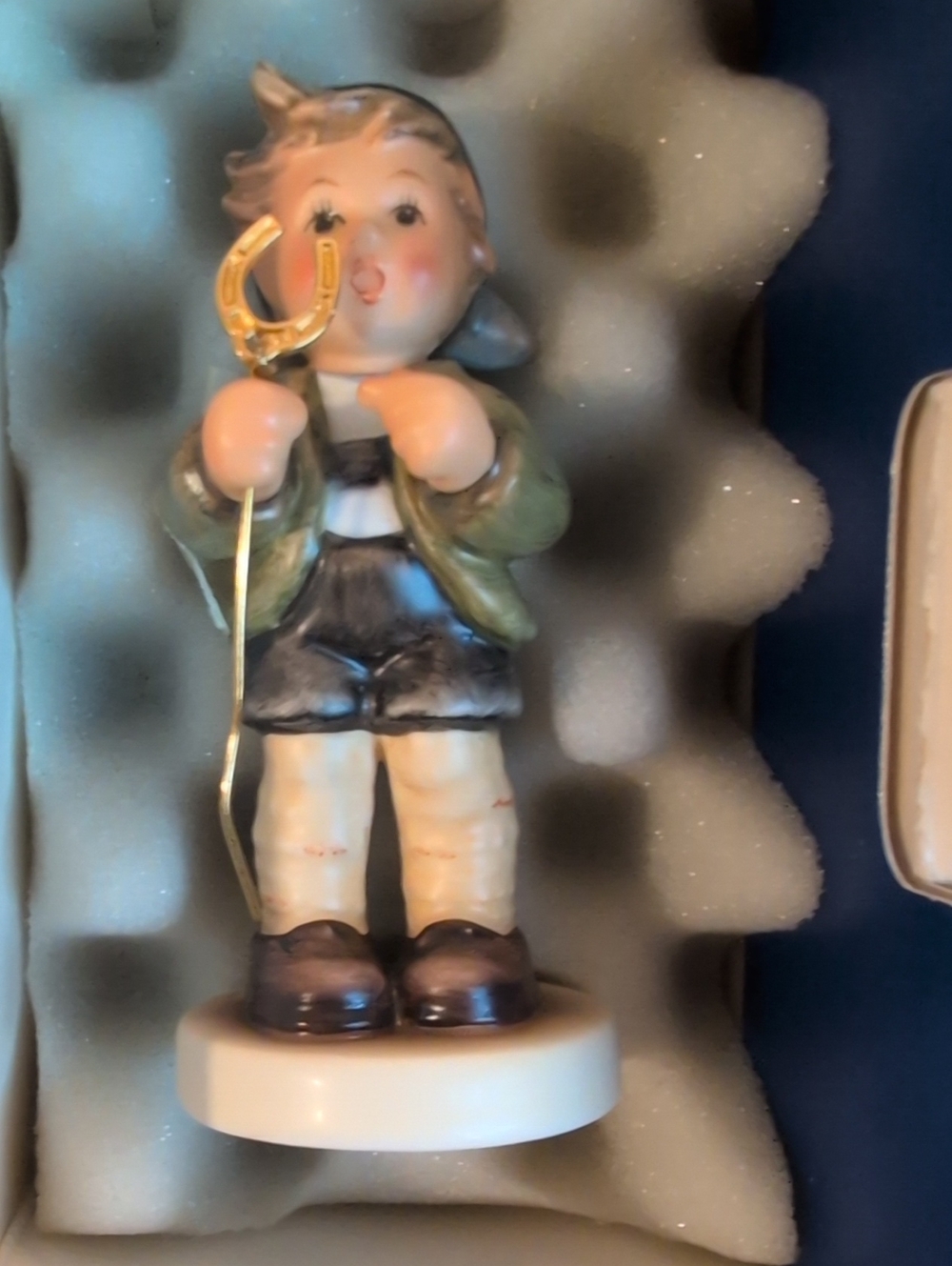 Hummel Porcelain Boy Figurine in Green Jacket and Cream Pants